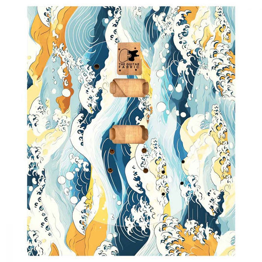 Kanagawa Wave Guitar Skin vinyl sheet rolled with wooden dowels showing full wave pattern in blue, white, yellow, and navy