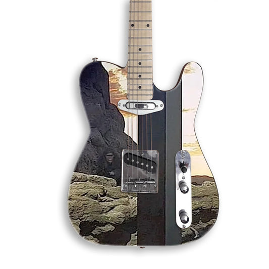 Dawn Monolith Apes guitar skin on a black Tele-style guitar