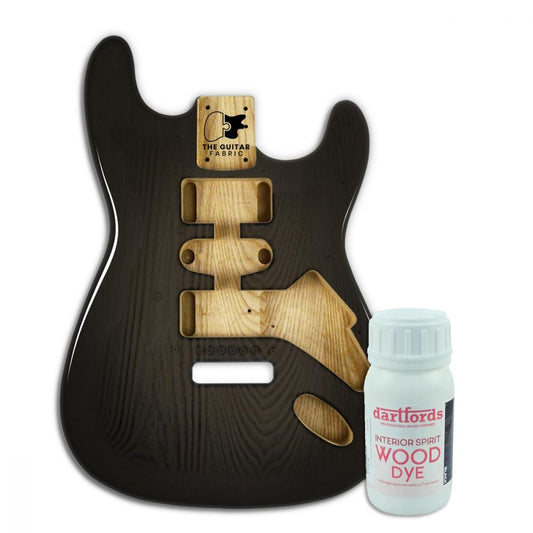 Alcohol-based black wood dye 230mL bottle displayed next to guitar body with natural wood inlays