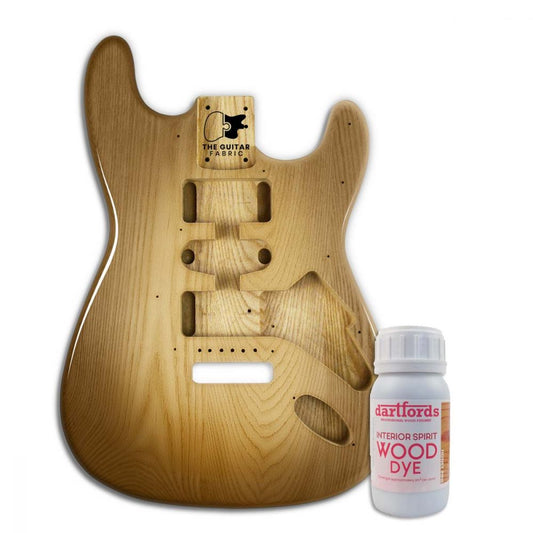 Pine Honey alcohol-based wood dye 230mL bottle displayed next to unfinished guitar body
