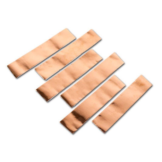 Six copper tape sheets arranged in diagonal rows, adhesive backing visible