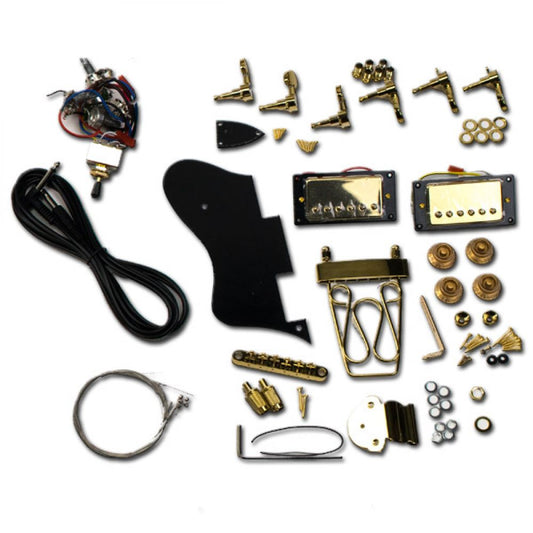 Complete ES335 gold hardware set laid flat showing all components including pickups, machine heads, bridge, and electronics