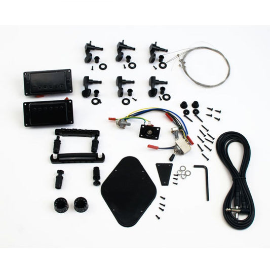Complete Set Guitar Parts PR black laid flat showing humbuckers, machine heads, electronics, hardware, and wiring from above