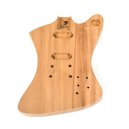 Firebird-style mahogany guitar body front view showing routed cavities and bridge positioning holes
