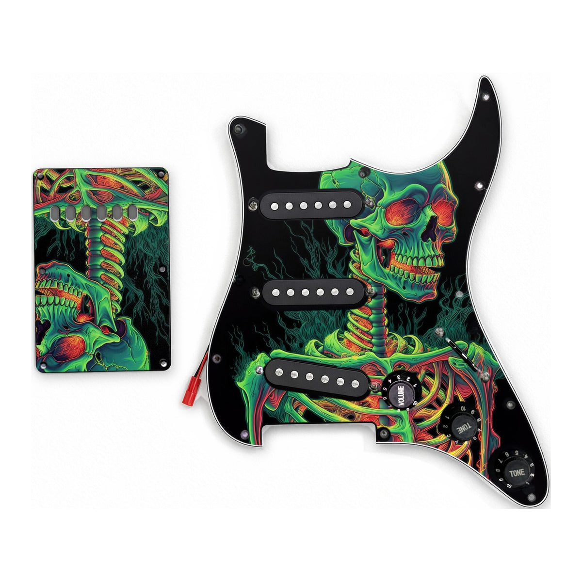 Loaded ST-style pickguard and matching tremolo cover, skull artwork, black pickups