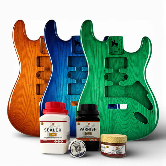 Mahogany Vintage Finish Kit with three finished guitar bodies in orange, blue, and green alongside sealer, varnish, and