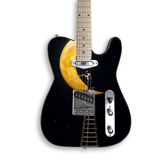 Painting the Moon guitar skin on a black Tele-style guitar
