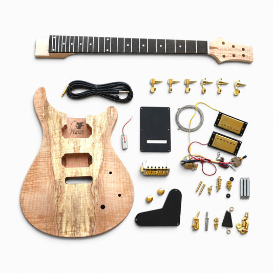 PR kit with spalted maple top and gold hardware, all parts laid flat: unfinished body, maple neck, ebony fretboard, humbuckers, tremolo