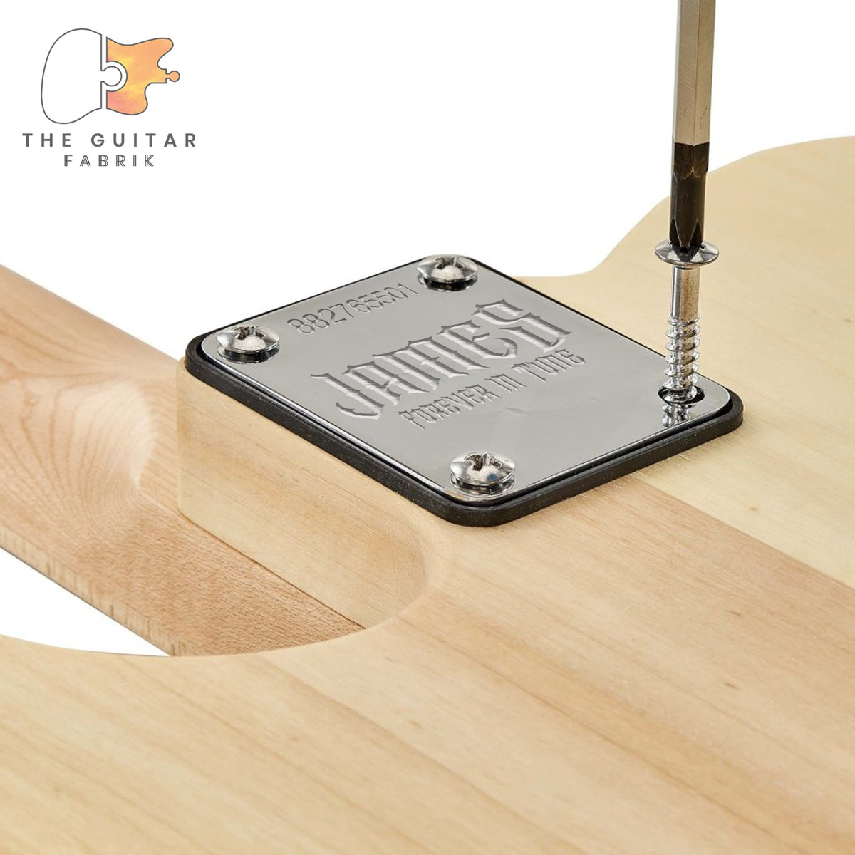 Engraved chrome neck plate screwed onto a guitar body