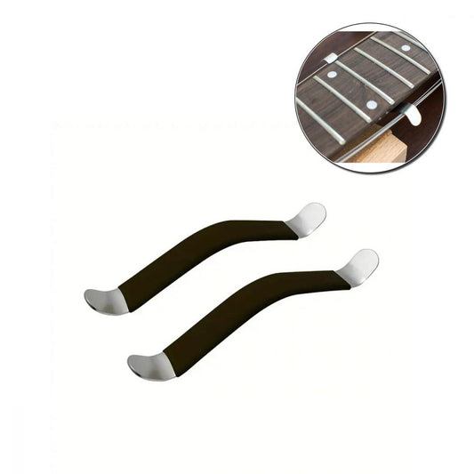 Two black metal guitar string spreaders with white end caps, angled side view