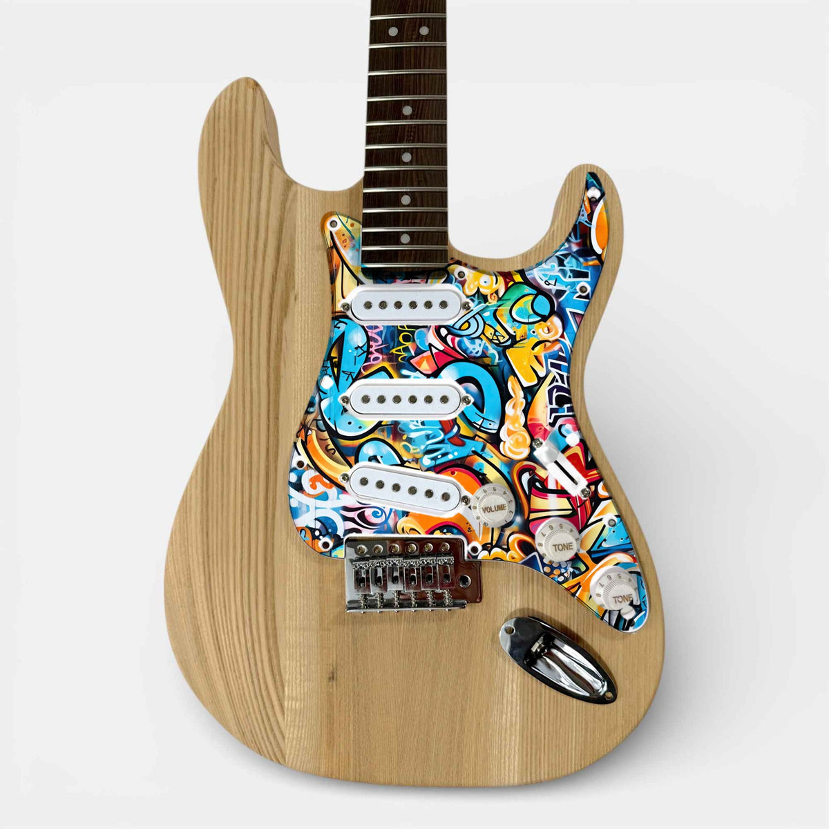 ST-style ash guitar kit assembled with the custom artwork pickguard fitted
