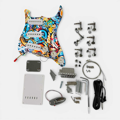 Hardware of the ST-style kit with the custom artwork pickguard, loaded, and the tremolo cover