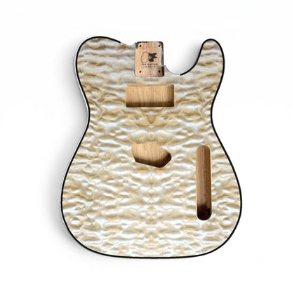 TL-style guitar body, quilted maple veneer, black binding