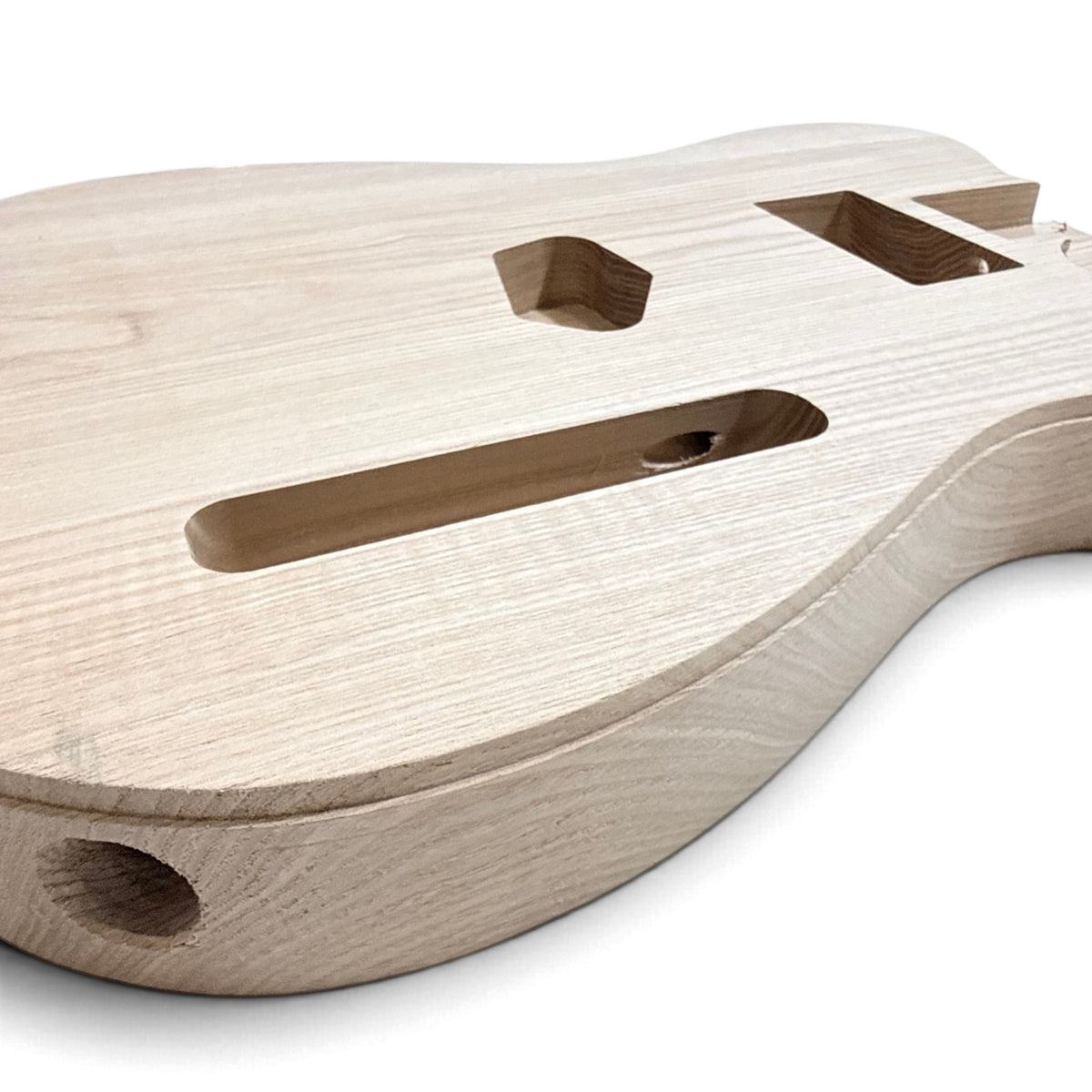 Binding channel routed along the edge of the guitar body